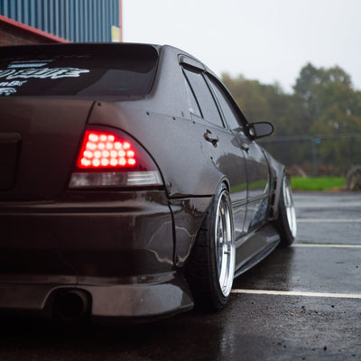 Zento MS1 x Toyota Altezza Industrial Estate with camber, shown with polished finish and Zentino tyres urban shot