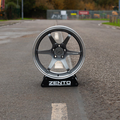 Zento MS4 Monoblock forged aluminium drift and motorsport wheel, shown with concave and dual colour on alloy wheel stand outside